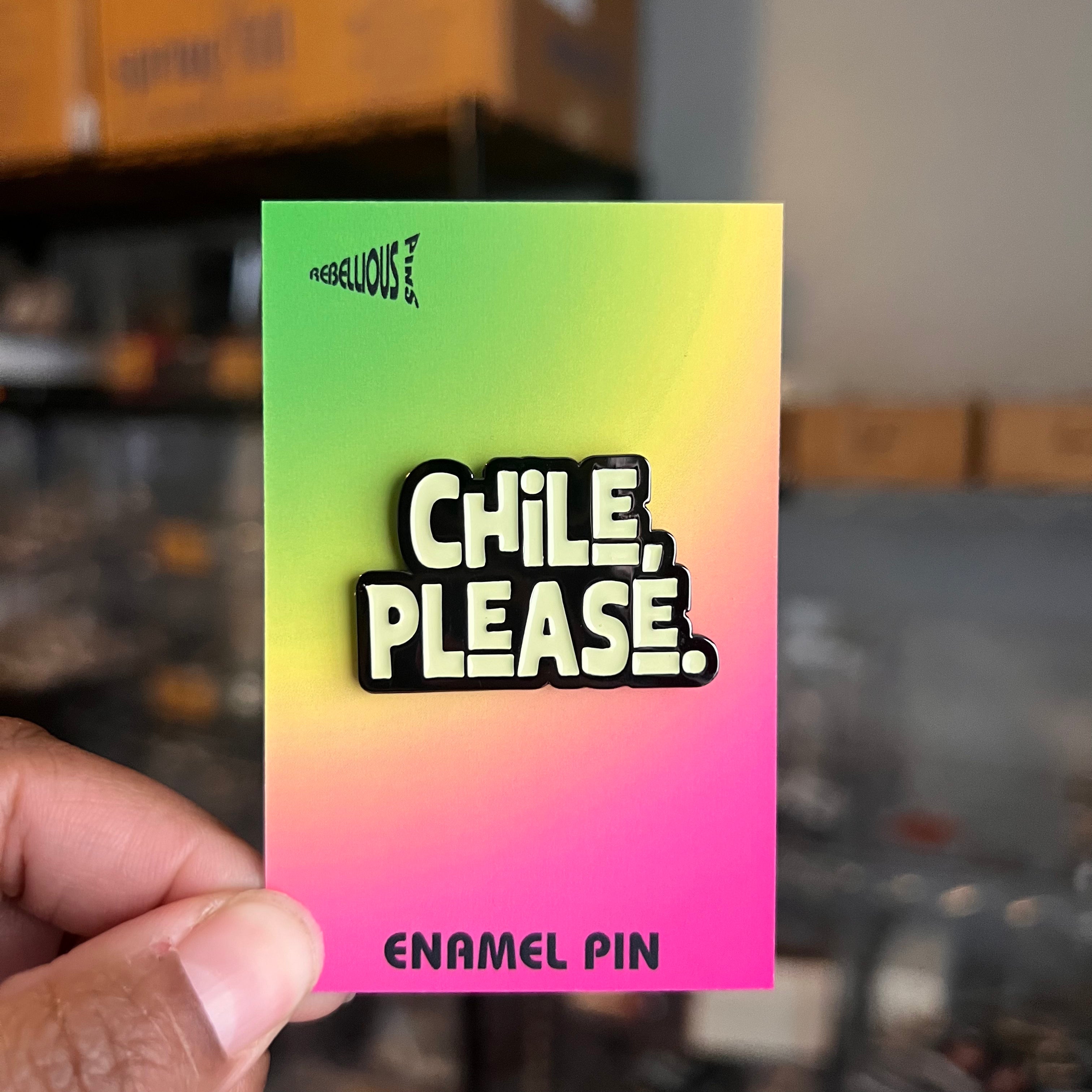 Gradient card with 'Chile, Please' text held by a hand in an indoor setting.