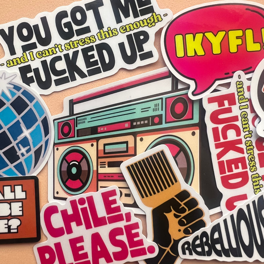 Collection of colorful stickers with various text and graphics 